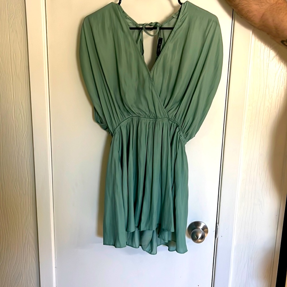 Sea green romper, never worn. Perfect condition